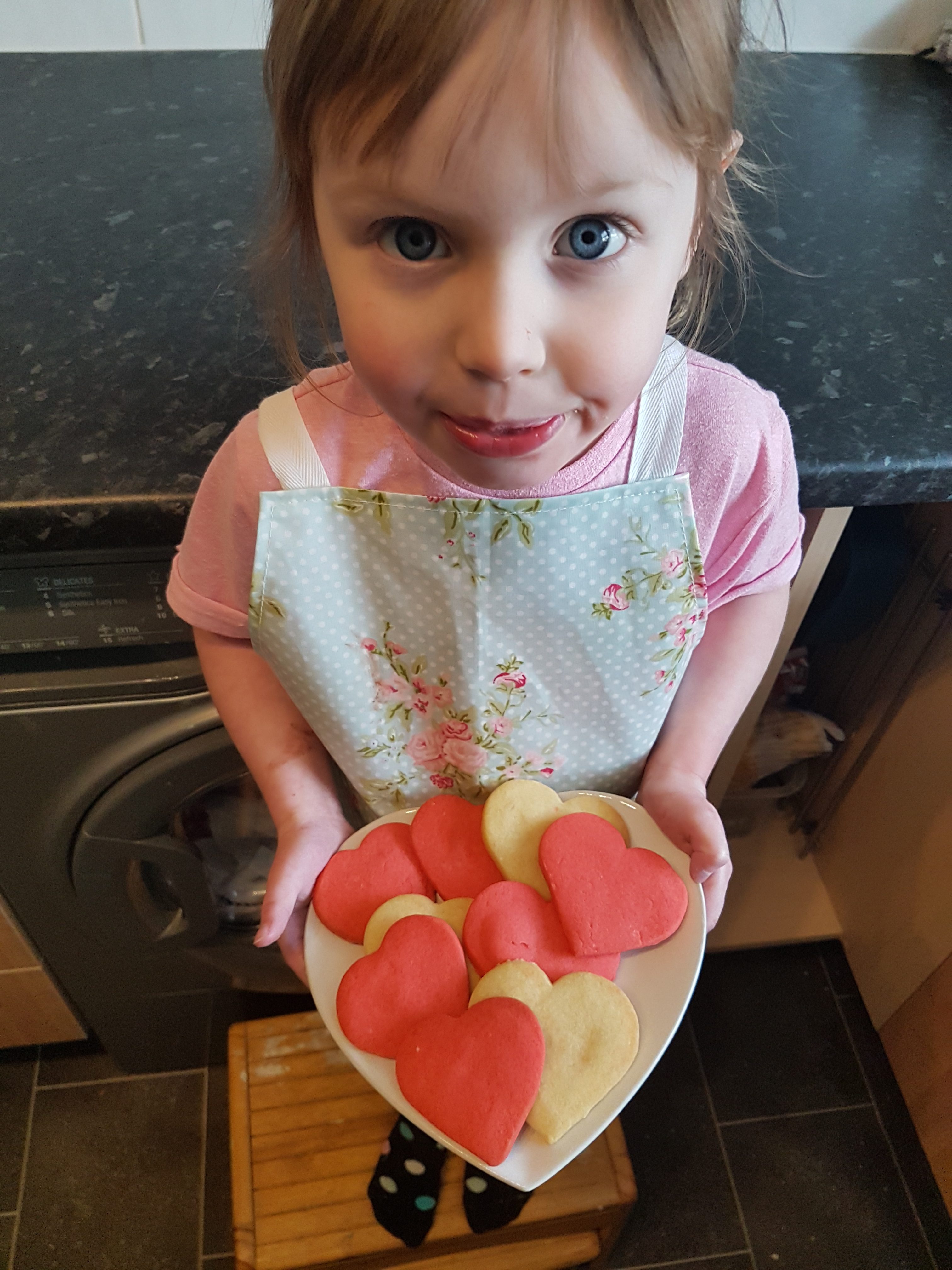 Emily baking valentines cookies 